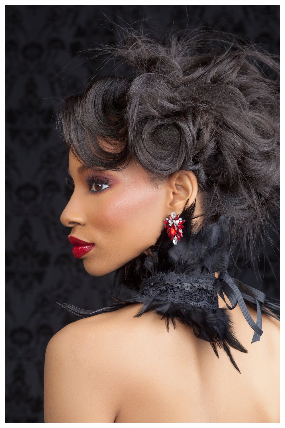 Black background editorial beauty hair by Kanika Styles