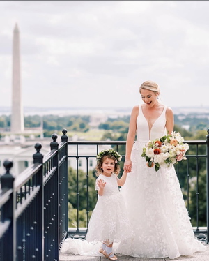 Bride walking with bouquet in downtown Washington DC