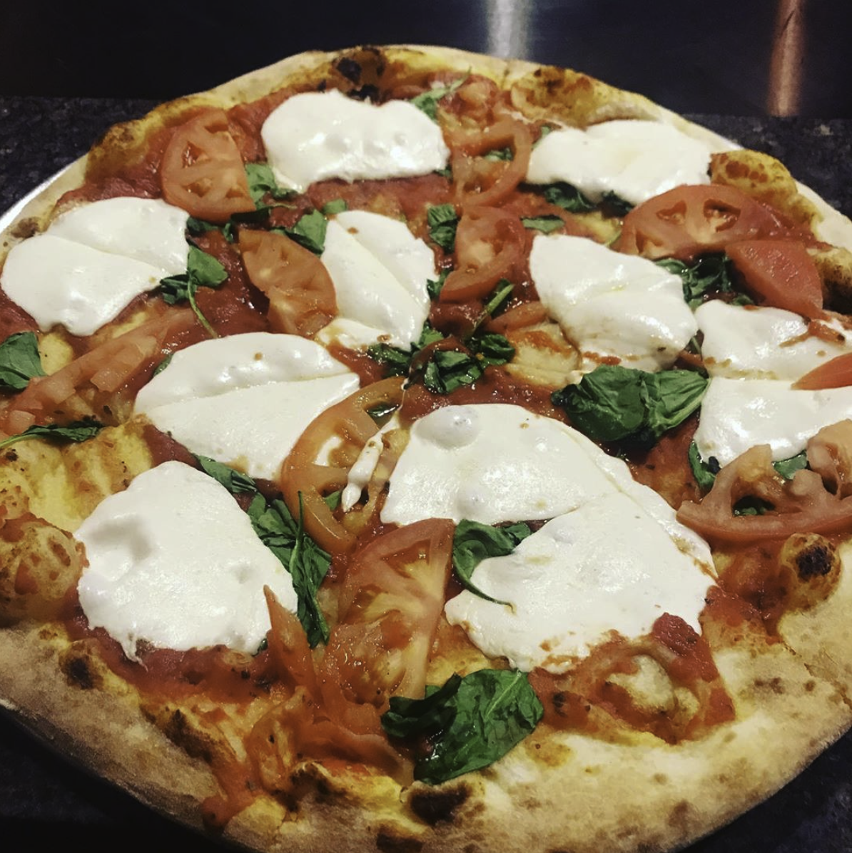 A Margherita Pizza from Hop’N Moose by @hopnmoose on Instagram