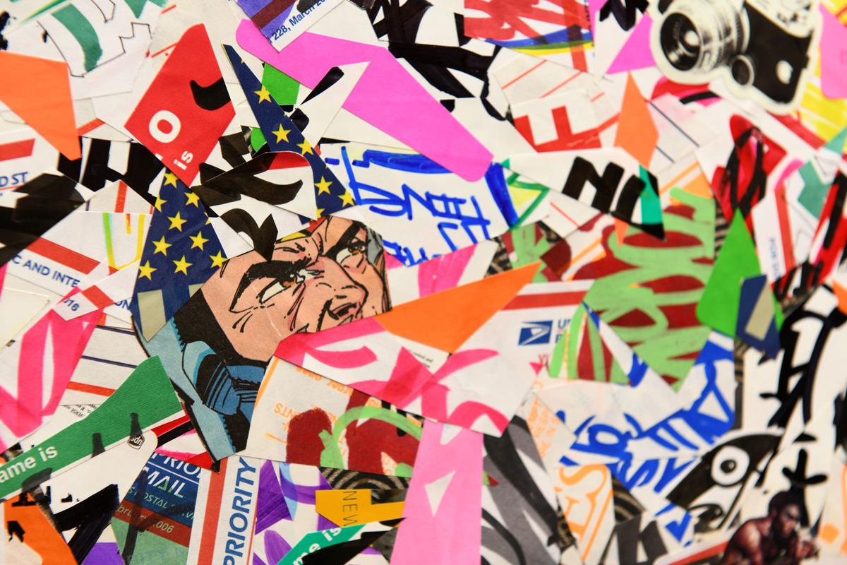 “New Age,” a sticker collage construction by Chris Mendoza. Photo by Robert Layman , Staff Photographer at the Rutland Herald.