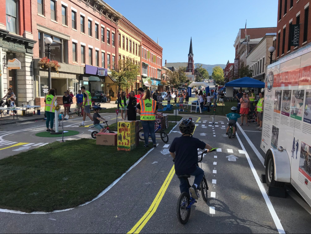 A child pedals in the traffic garden at the Green Street Challenge in Rutland, Vermont.