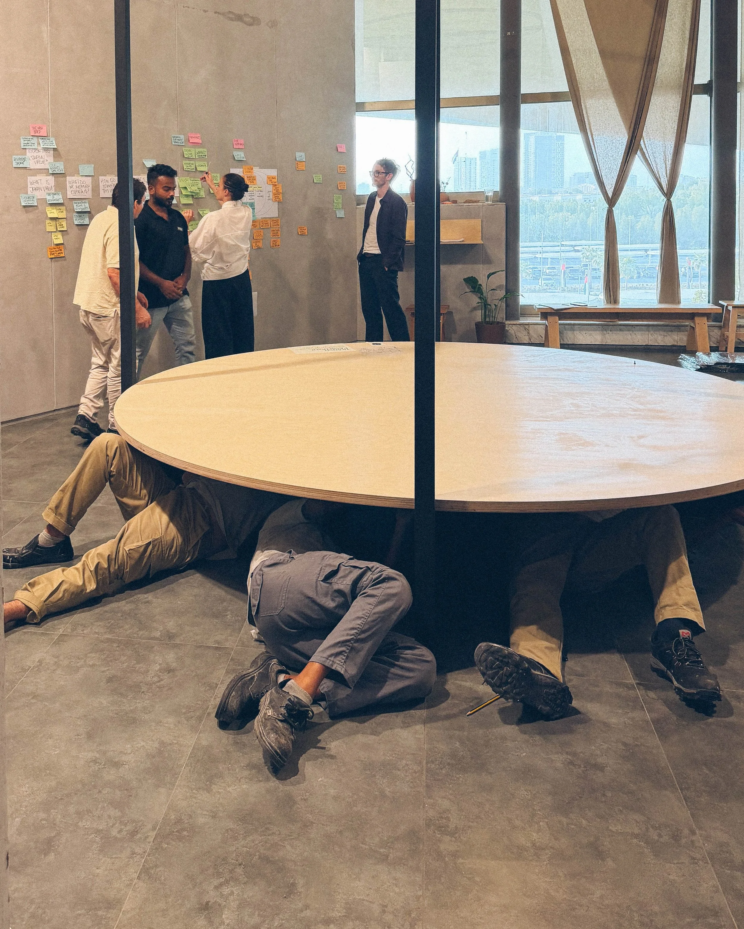 This about sums up the life of a multidisciplinary studio. The guys who built the table underneath the table, making sure the table does table things, so a design can sit on the table, while the narrative and structure for a completely different proj