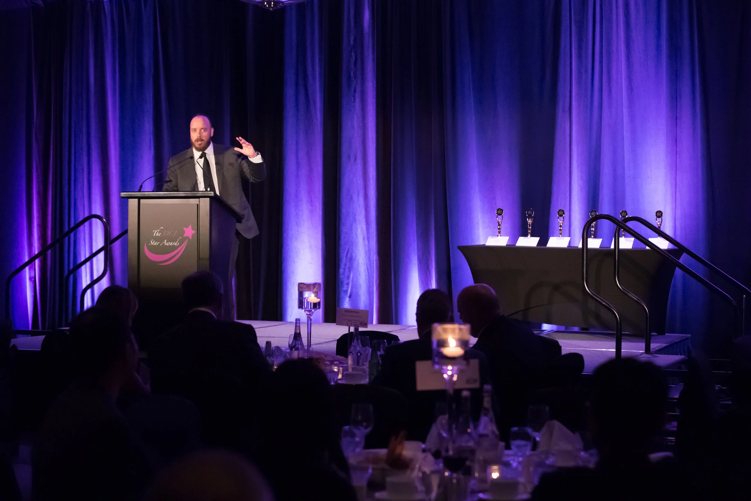 Evening Host and Comedian, Pete Zedlacher emcees the annual DCI Star Awards which commenced during the evening Gala Dinner of the 2018 DCI Business Summit.