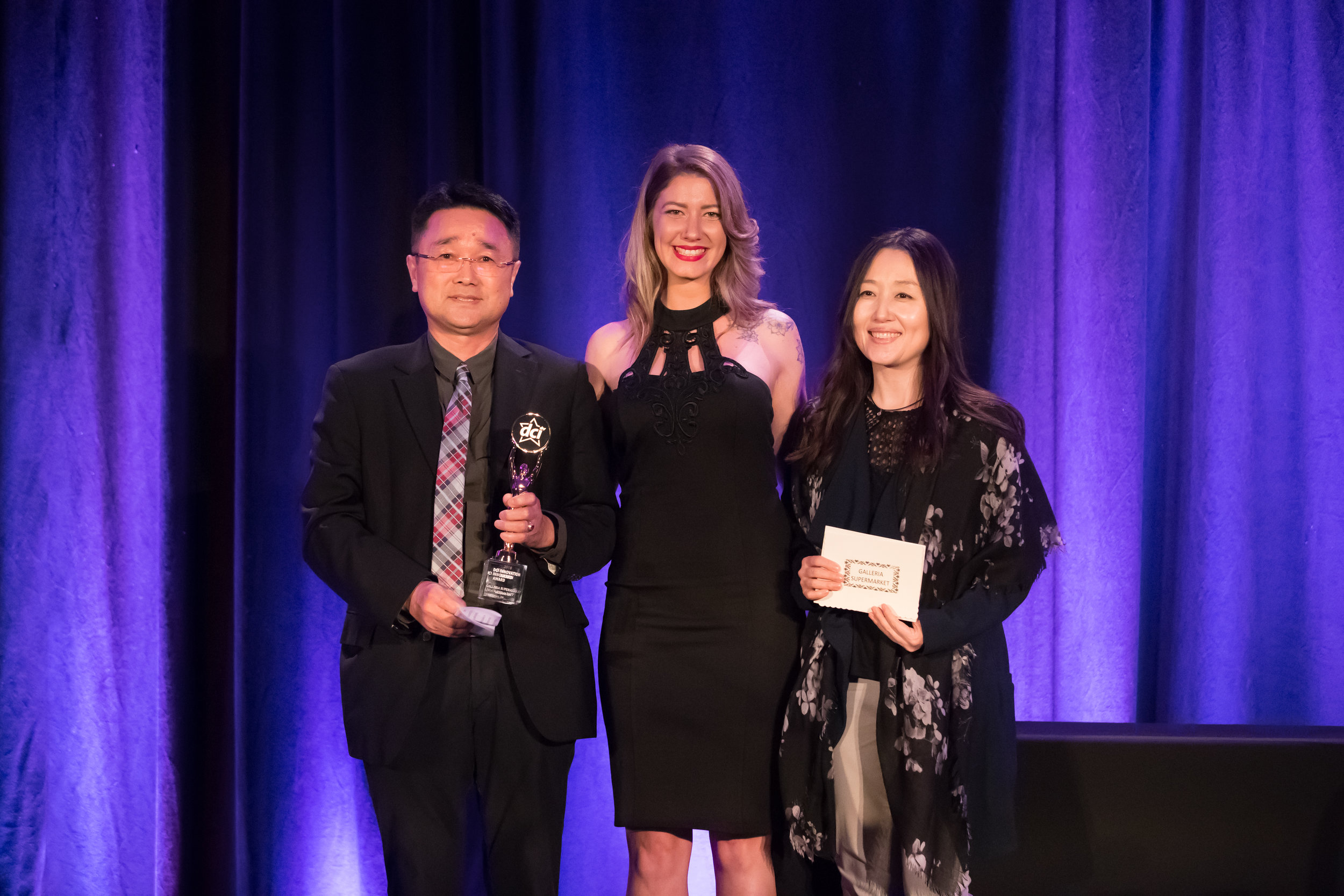 Peter Shin (Left) and Chris Yu (Right) With Star Awards Presenter (Centre)