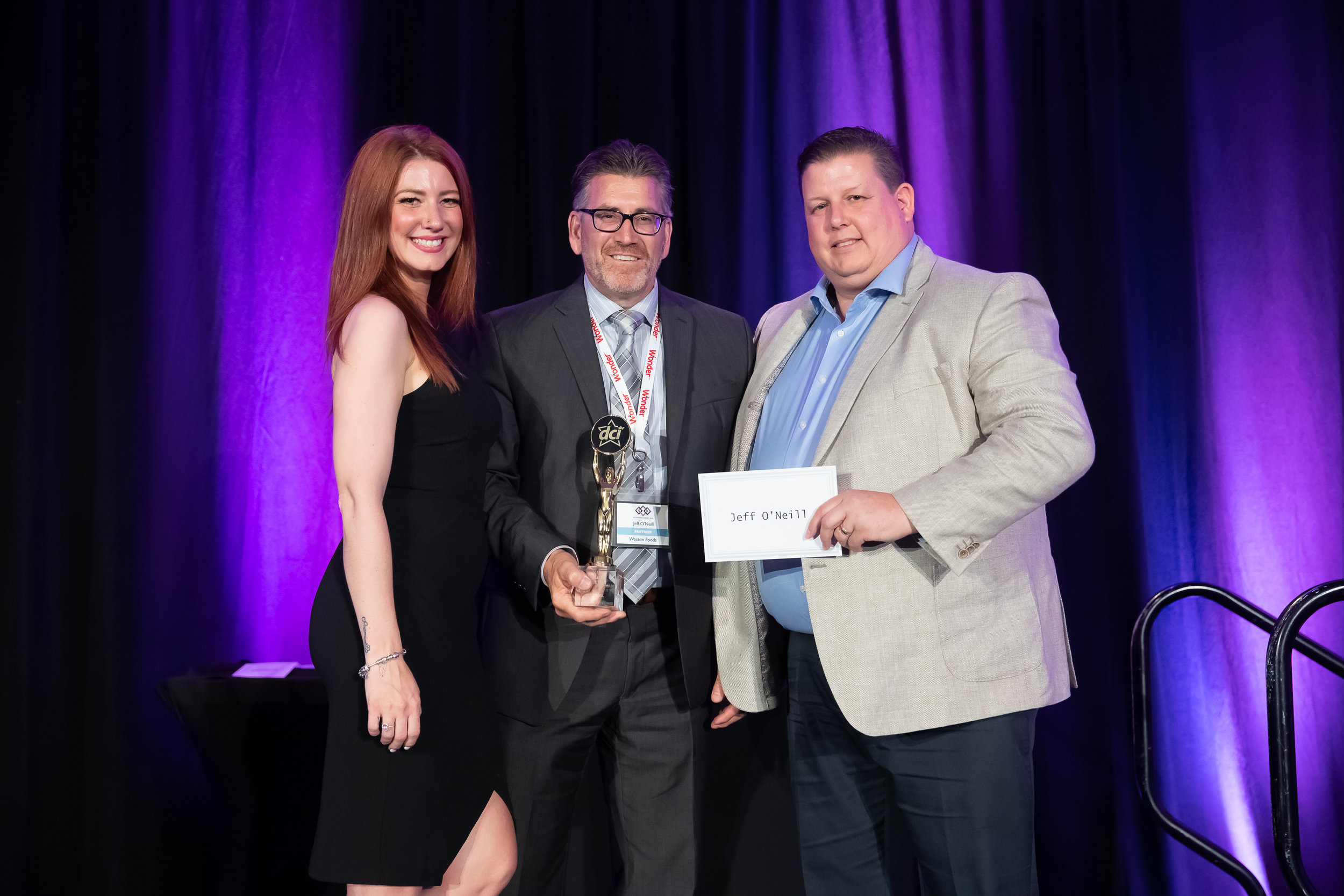 Star Awards Presenter Melissa Lynne-Schaffer, Jeff O'Neill of Weston Foods and Barry Lanteigne of DCI