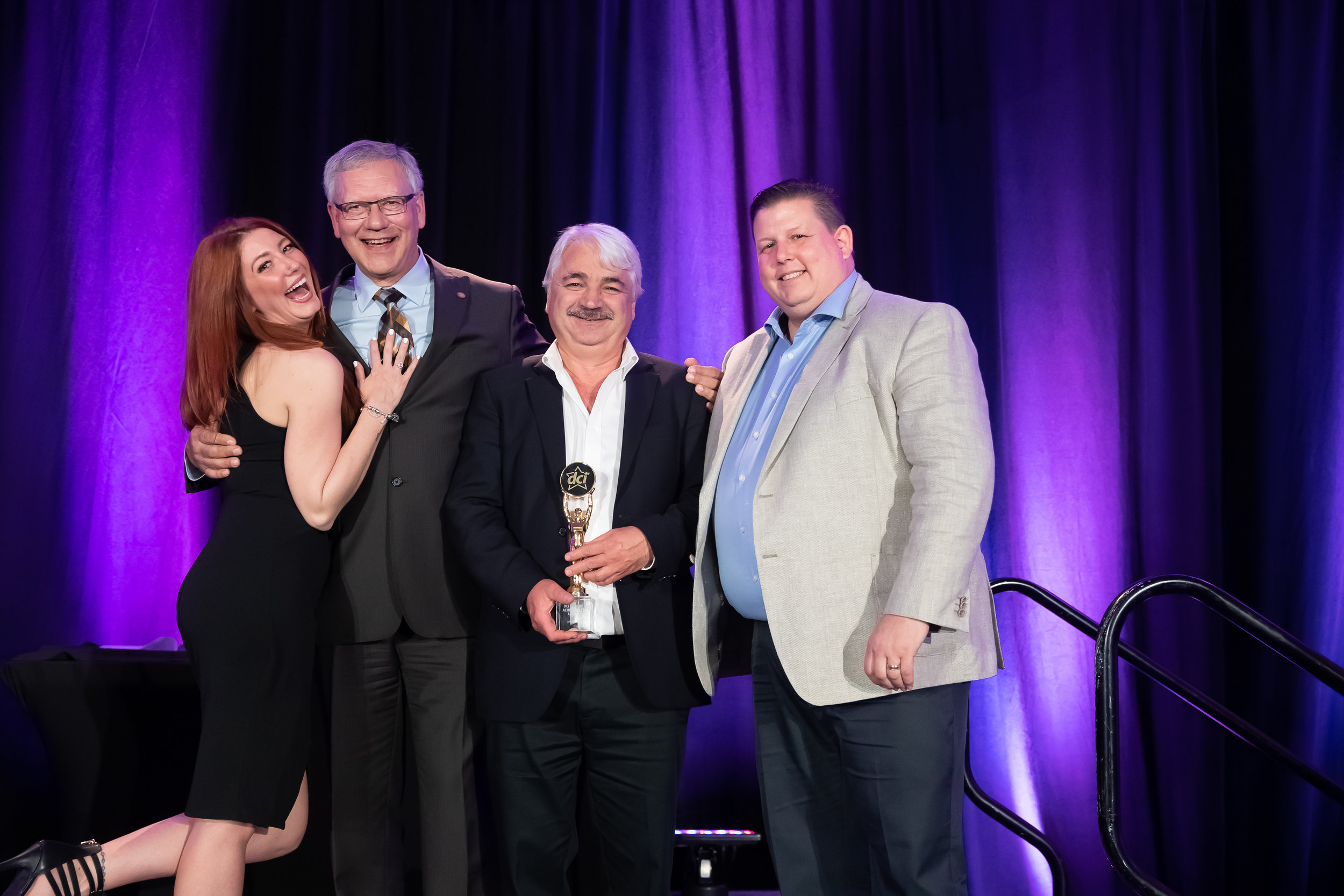Star Awards Presenter Melissa Lynne-Schaffer, DCI Past Chair Dave Powell of Atlantic Grocery Distributors, Jim Bexis of Sun Valley Market and Barry Lanteigne of DCI