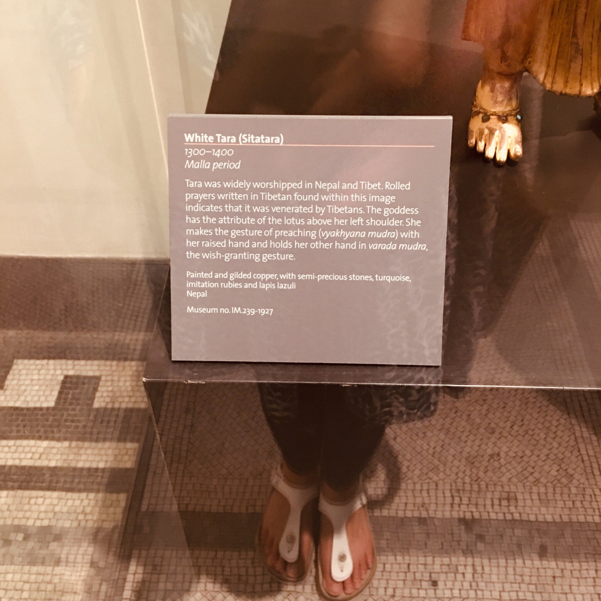 “Rolled prayers written in Tibetan” were found within Her.
