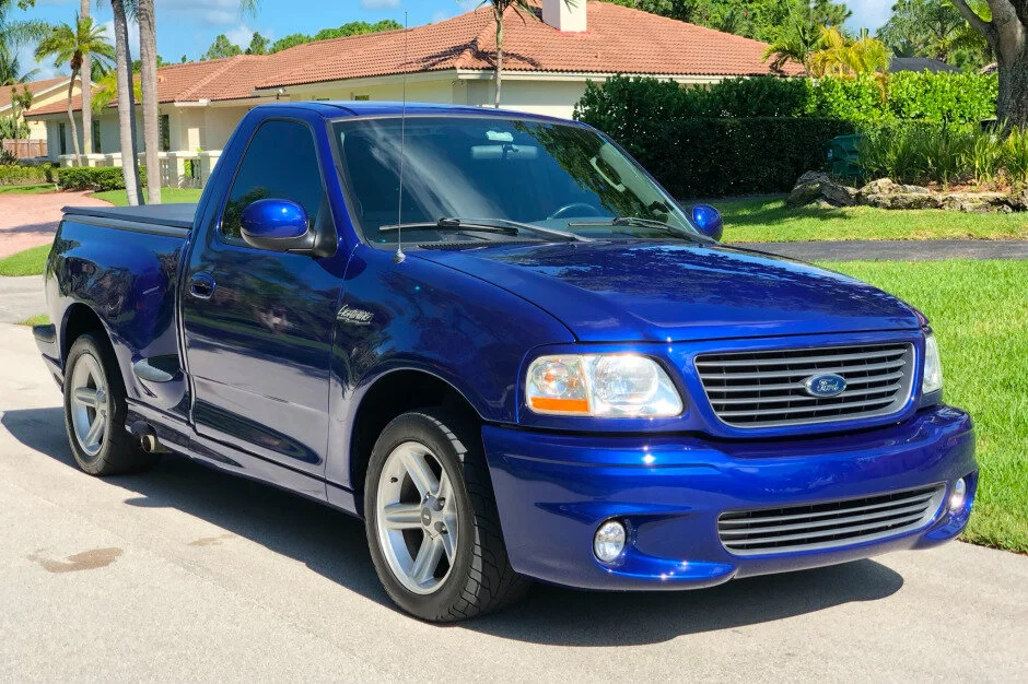 For Sale: 2004 Ford F-150 SVT Lightning (Sonic Blue, supercharged 5.4L V8, 4-speed auto, 40K miles)