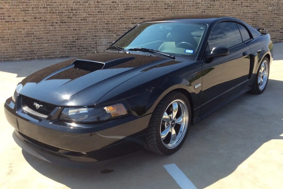 For Sale: 2003 Ford Mustang GT "Centennial" Edition (black, modified, 4.6L V8, 5-speed, 11K miles)