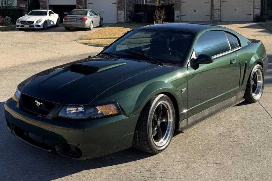For Sale: 2001 Ford Mustang Bullitt (#3011, Dark Highland Green, modified, supercharged 4.6L V8, 5-speed manual, 71K miles)