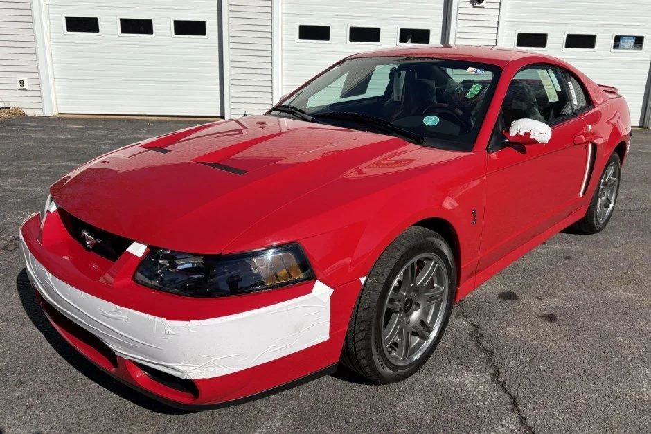 For Sale: 2003 Ford Mustang SVT Cobra “10th Anniversary Edition” Coupe (Torch Red, supercharged 4.6L V8, 6-speed manual, 14 miles)