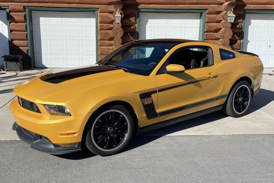 For Sale: Ford Mustang Boss 302 (#875, Yellow Blaze Metallic, black stripes, 5.0L "Road Runner" V8, 6-speed, 11K miles) — StangBangers