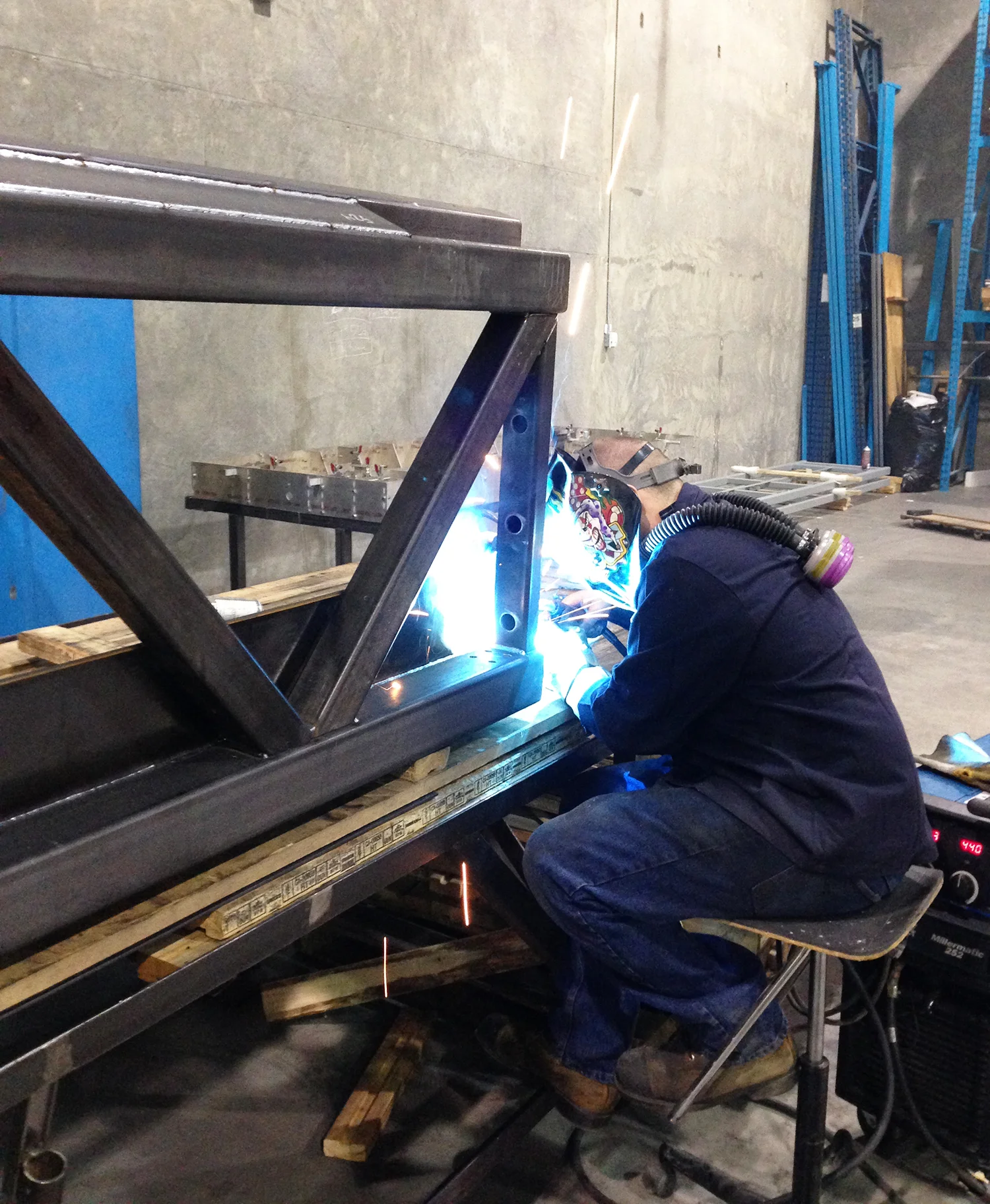 All EXO components are fabricated in house at their facility in Langley BC. Shown here is the CWB certified welder assembling a truss for a future EXO building.