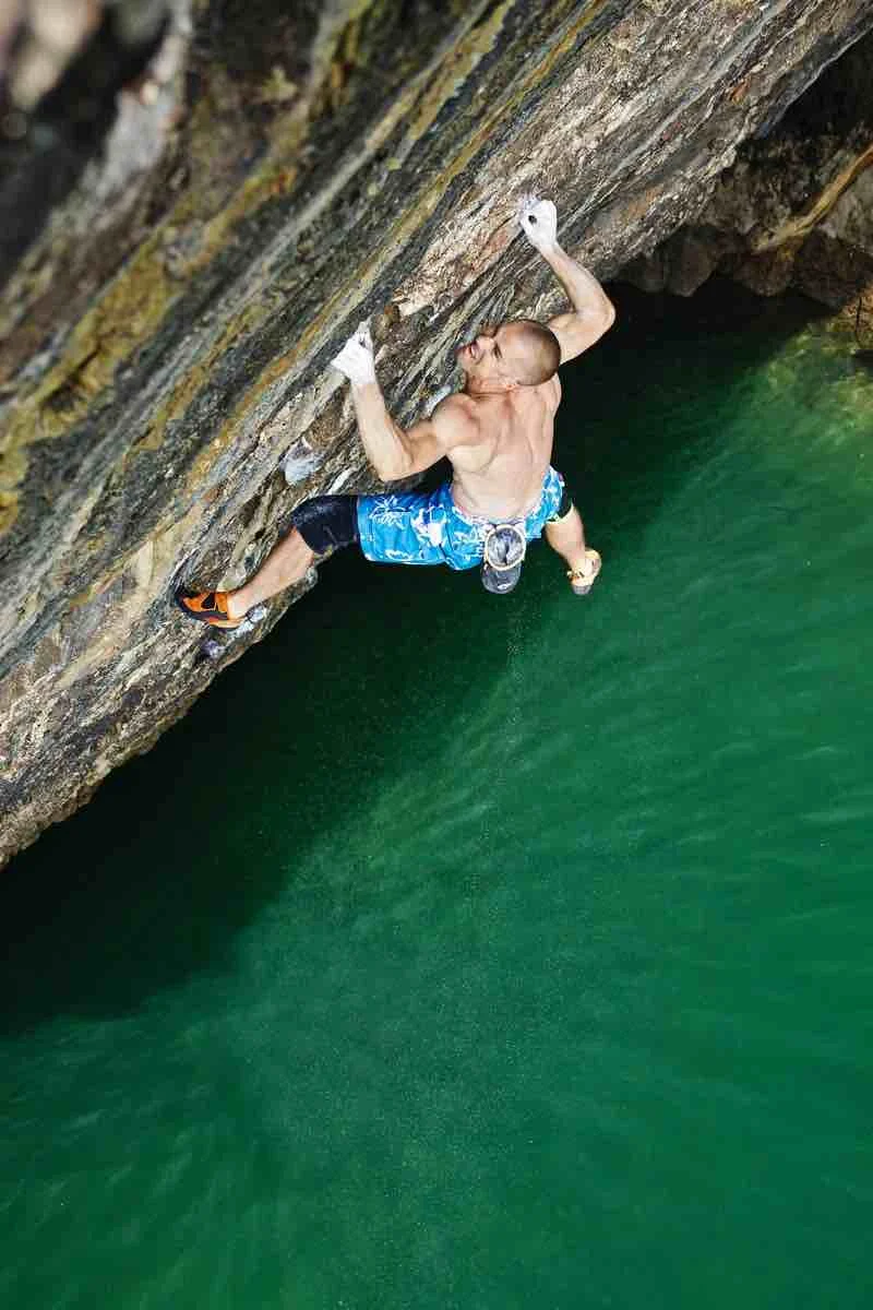 First ascent of Olympiad 8b in Pembroke in 2012 - the UK's hardest DWS at the time and unrepeated for 6 years. Photo: Lukasz Warzecha - Polished Productions