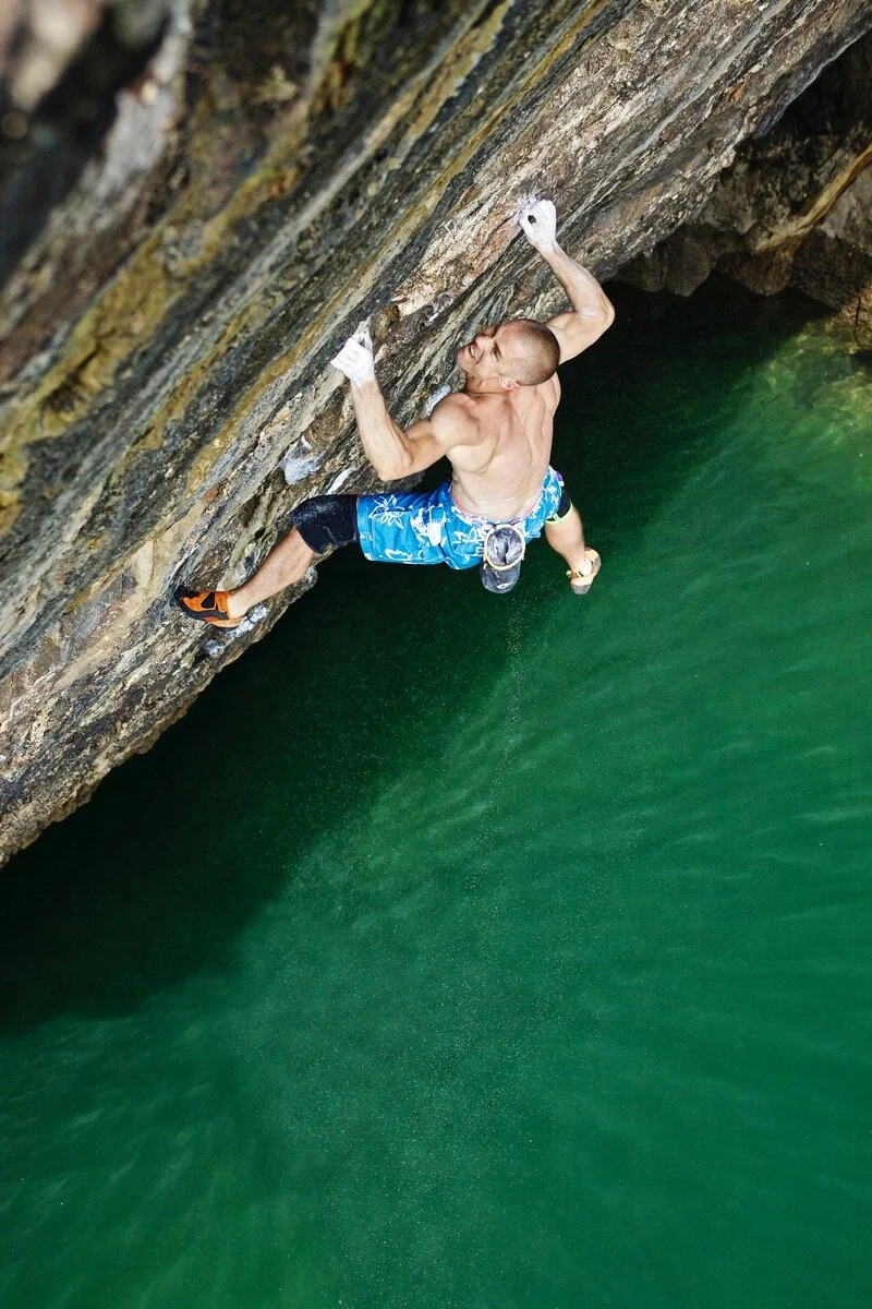 First ascent of Olympiad 8b, Pembroke. Britain's hardest DWS in 2012. Photo: Lukasz Warzecha.