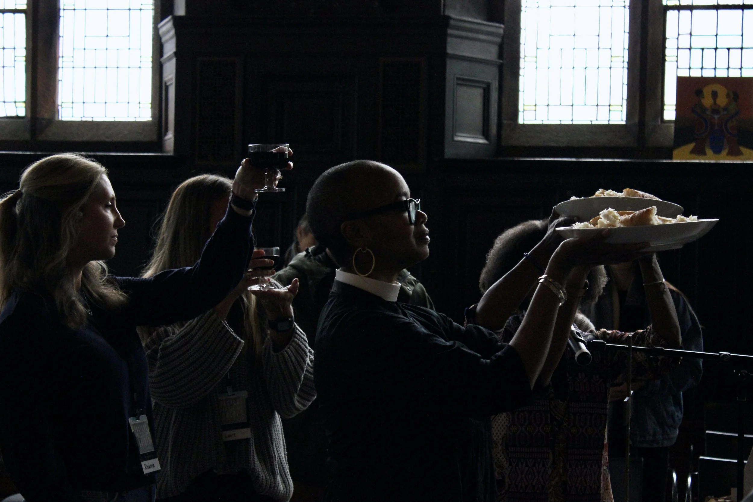 Women raising Eucharist.jpeg