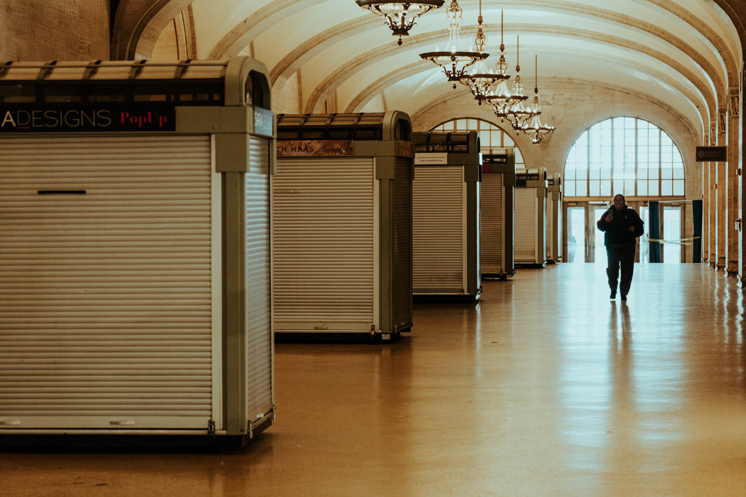  In stark contrast to Grand Central’s routinely ceaseless crowds of tourists and commuters, the station is all but empty, while its shops, stalls, and restaurants all stand shuttered. 