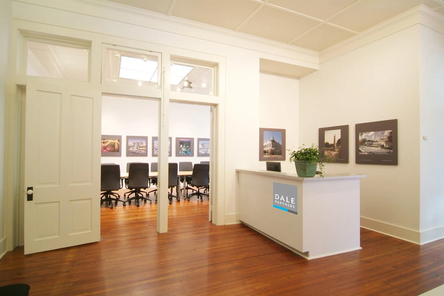Dale Coast front desk with logo.jpg