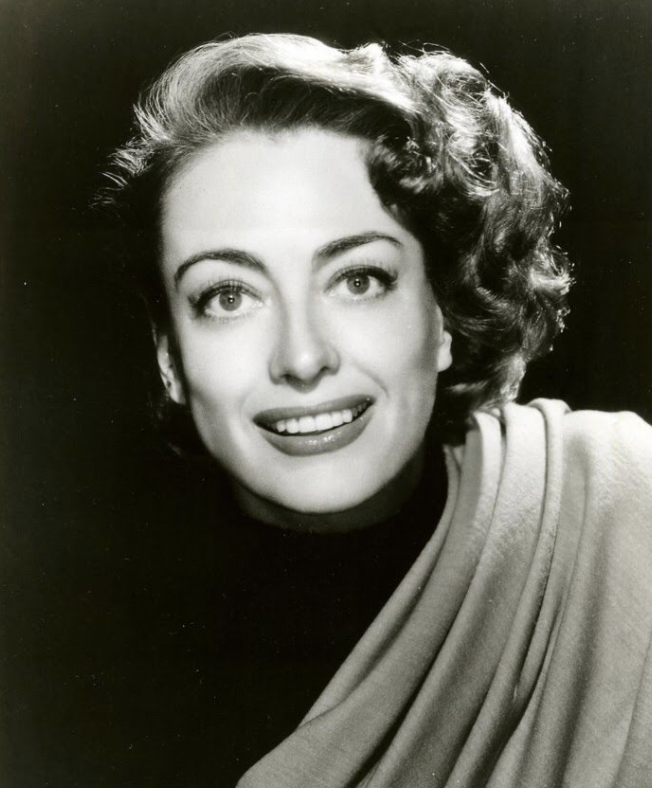 And here's pic of Joan Crawford smiling...for the road :)