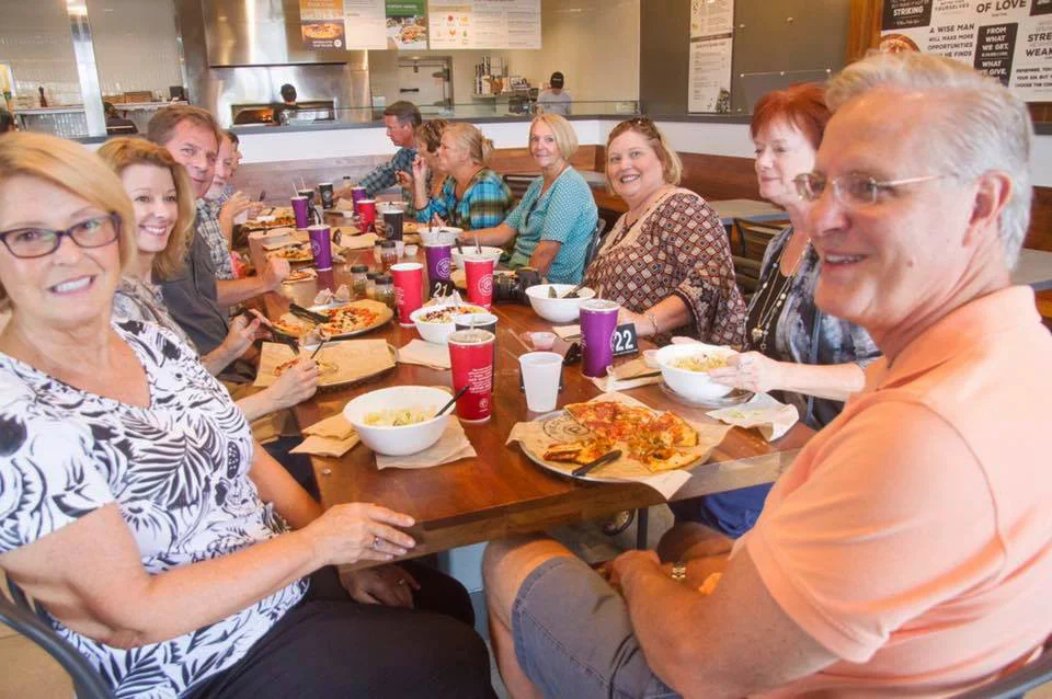 The Hoeft LifeGroup enjoying a meal together.