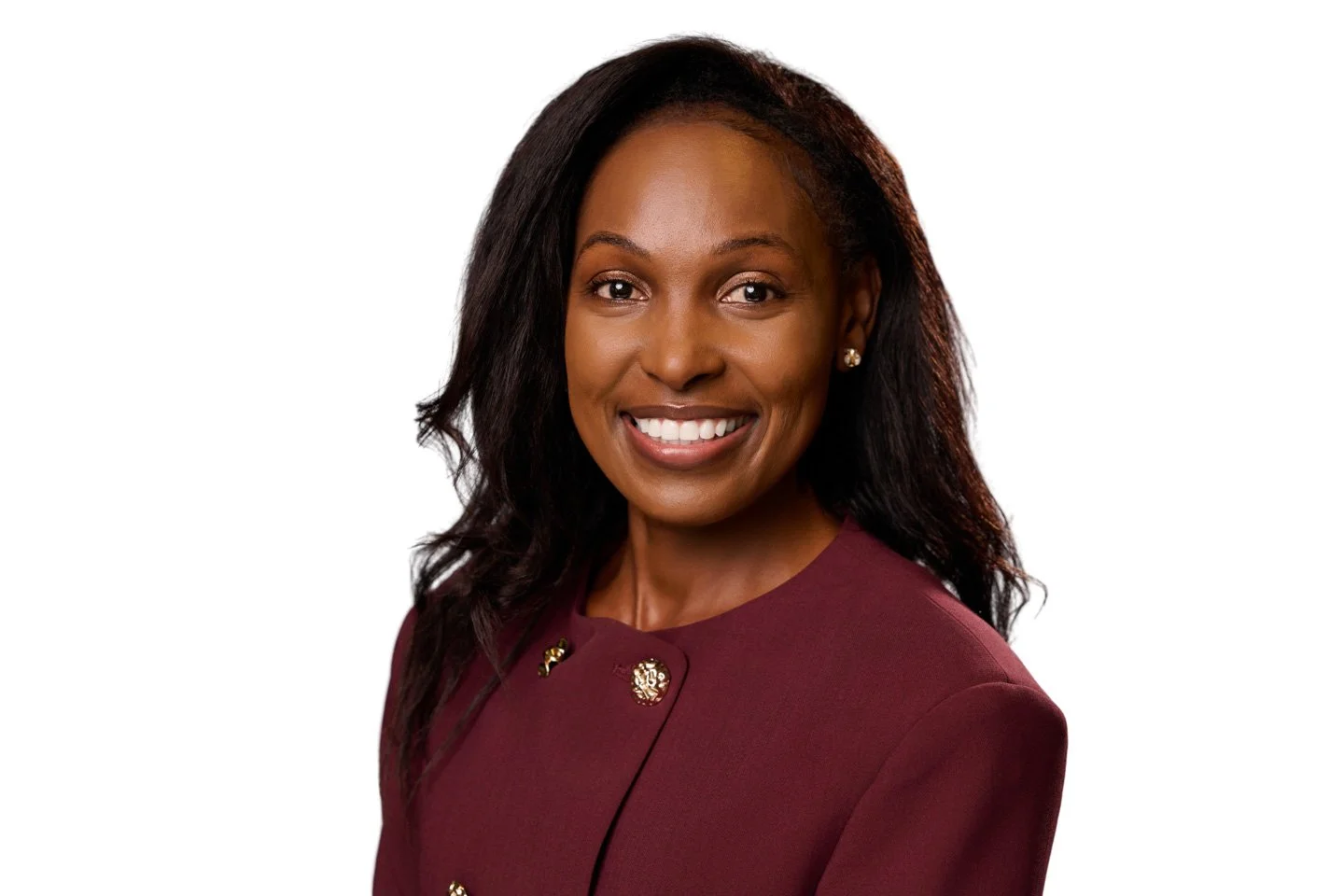 Attendees posing for professional conference headshots at a Denver business event.