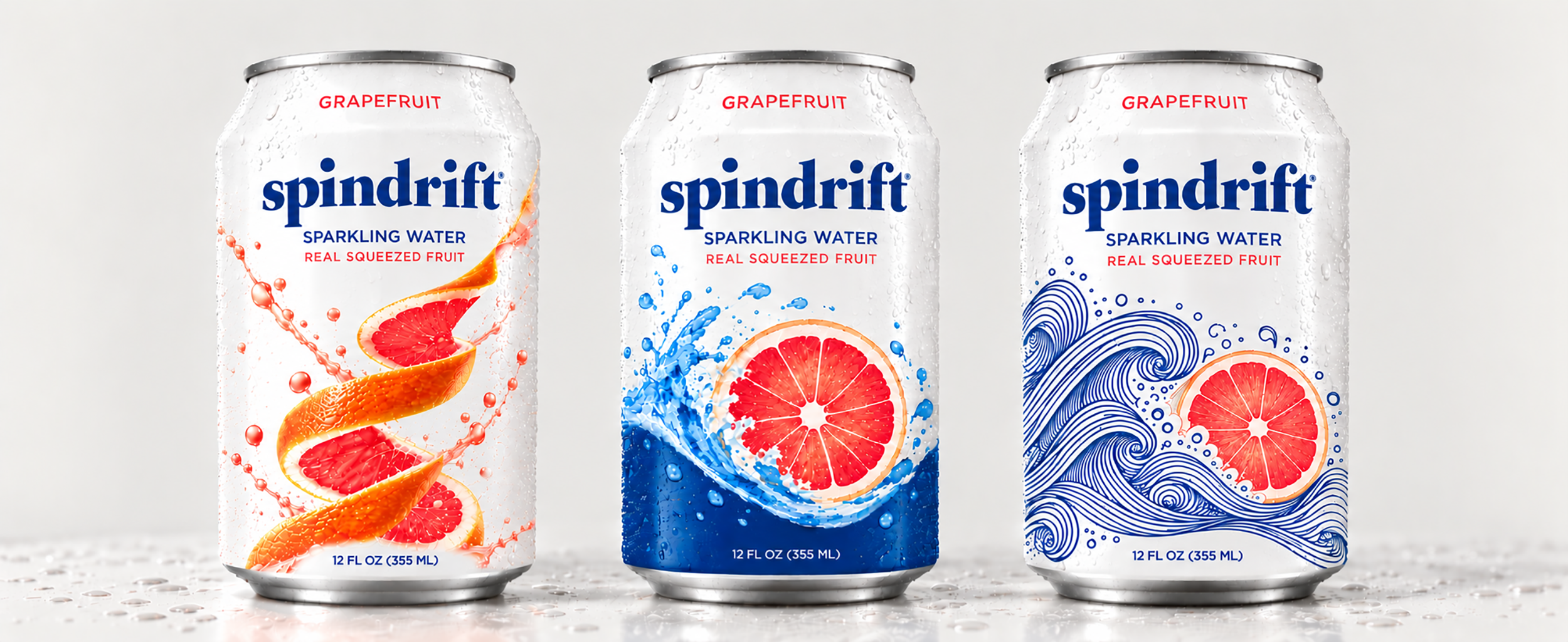 Spindrift Grapefruit Cans in Water Splashes.png