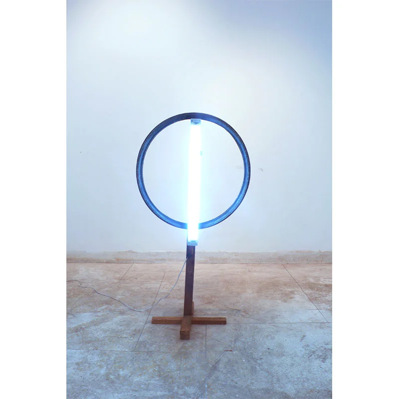 Halo in the Night , 2009 tire, florescent light, wood 44 x 23.5 x 16" Edition of 3 Inquire >