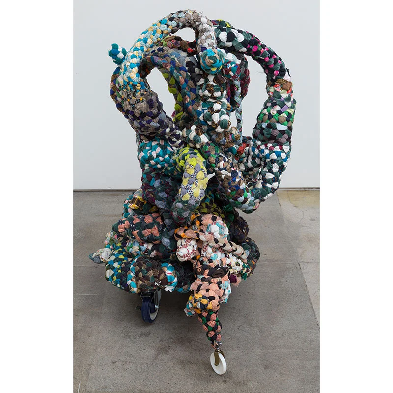 Janitor, Banker, Subway , 2016 donated fabric, thread, wheels, epoxy resin 45 x 30 x 28" Inquire >