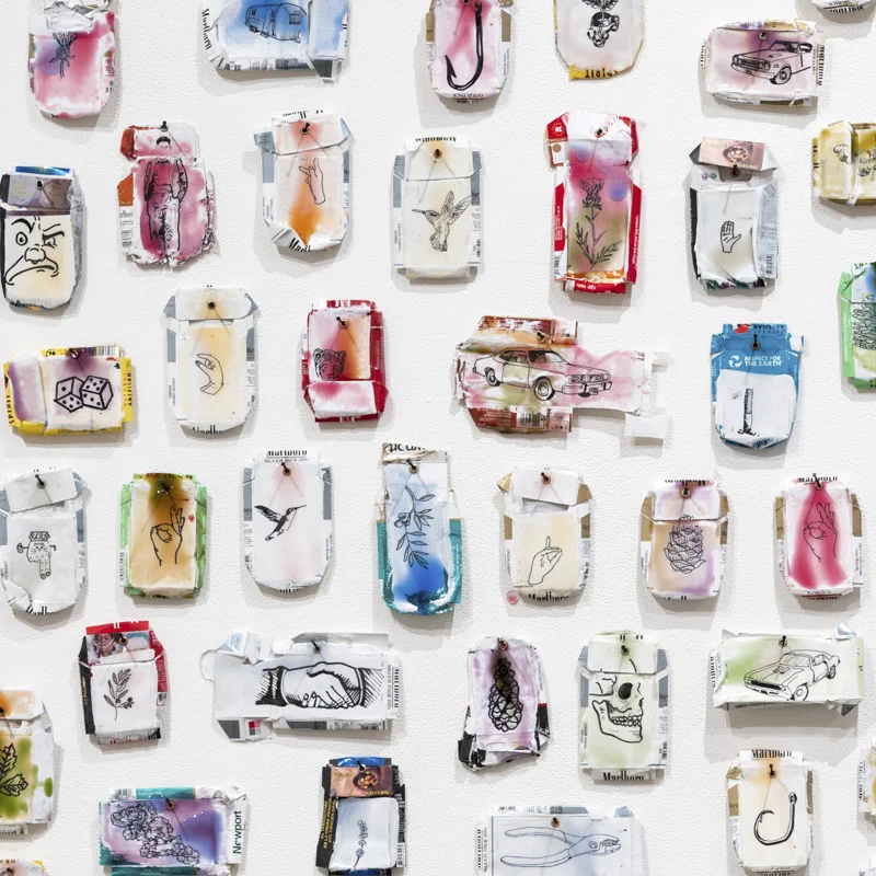 Trash Gyre 1-89 (detail), 2018-19 cigarette packaging, ink and resin dimensions variable Inquire >