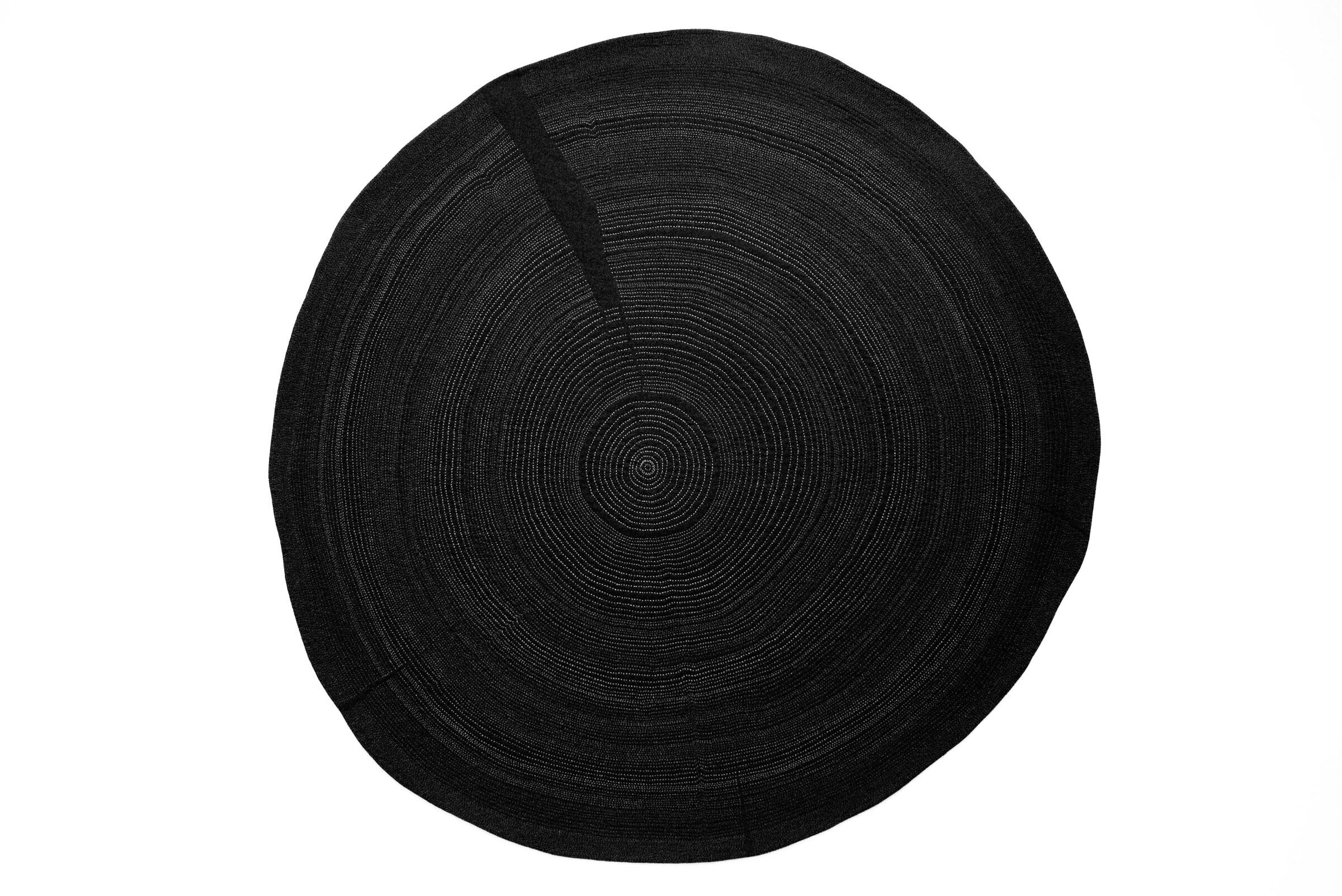     Anasazi 12th Century Migration , 2013 hand-stitched cotton 55" diameter      