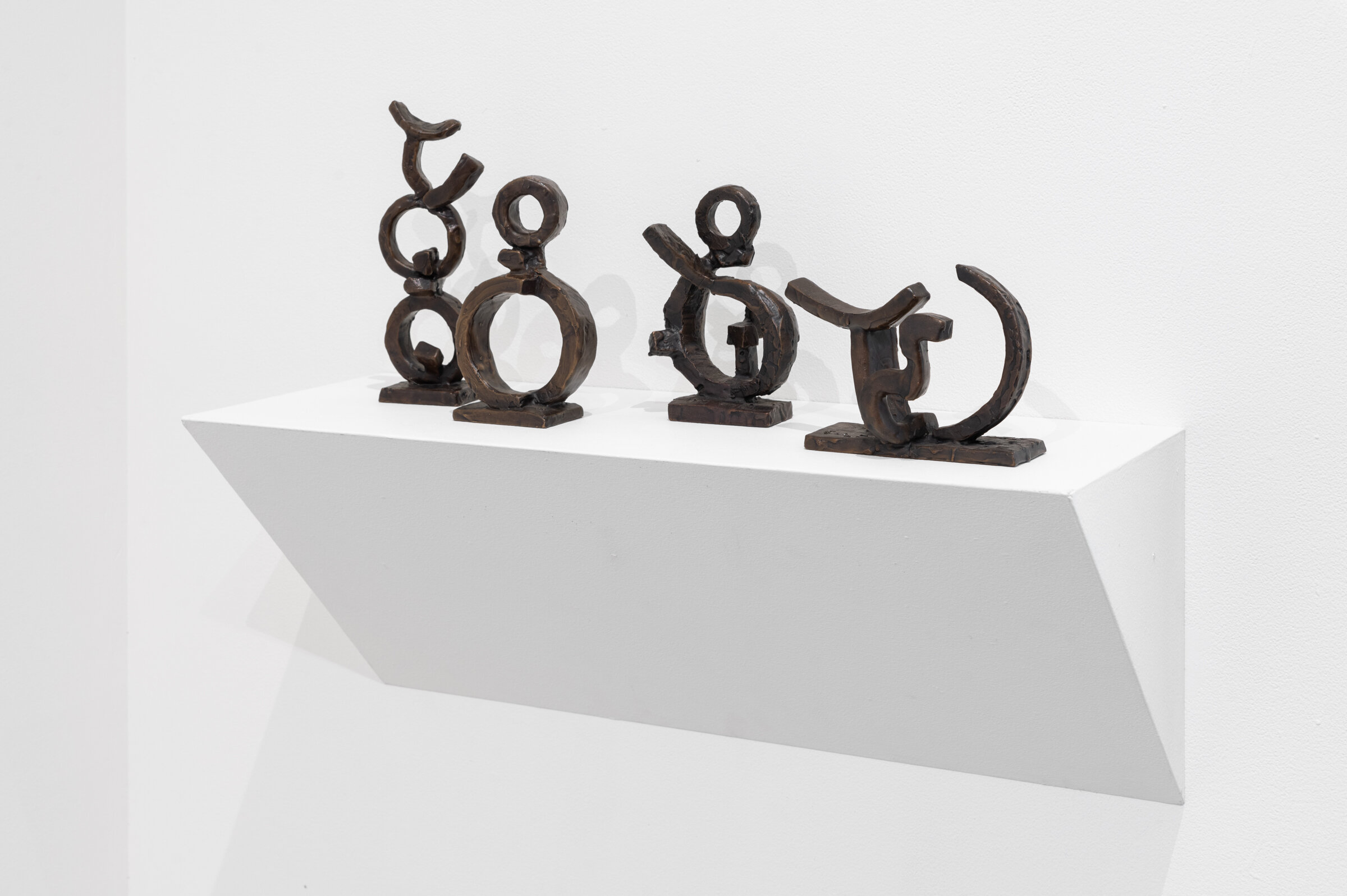  Left to Right : Nepal I, Nepal III, Nepal II, Naga Temple , 2020, small bronze sculptures,  dimensions approximately 9 x 3.5 x 2” and under 