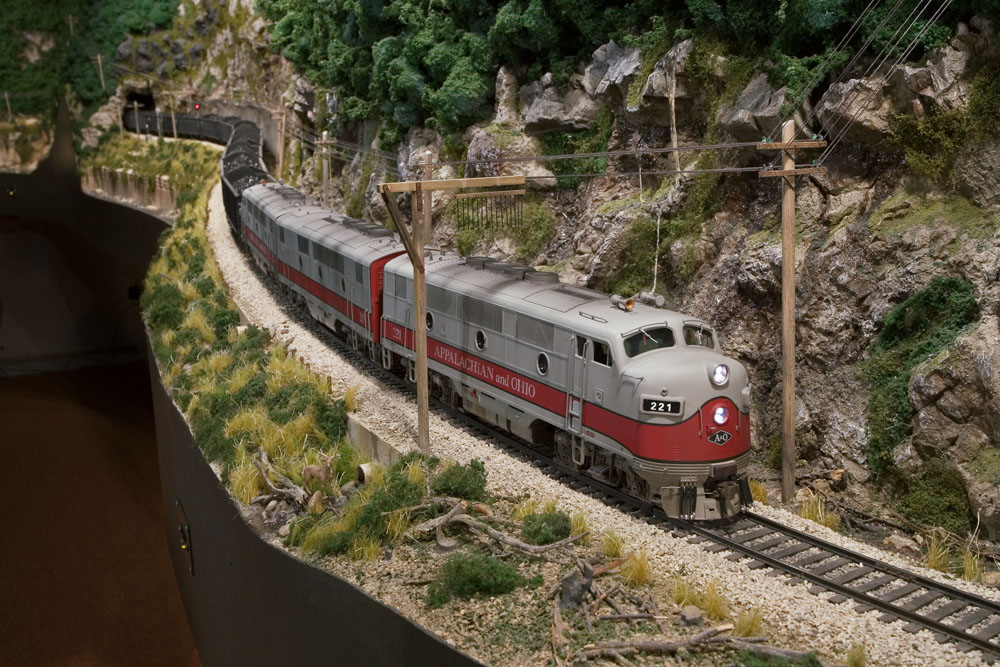  A trio of F3s leads a coal extra through the river gorge. 