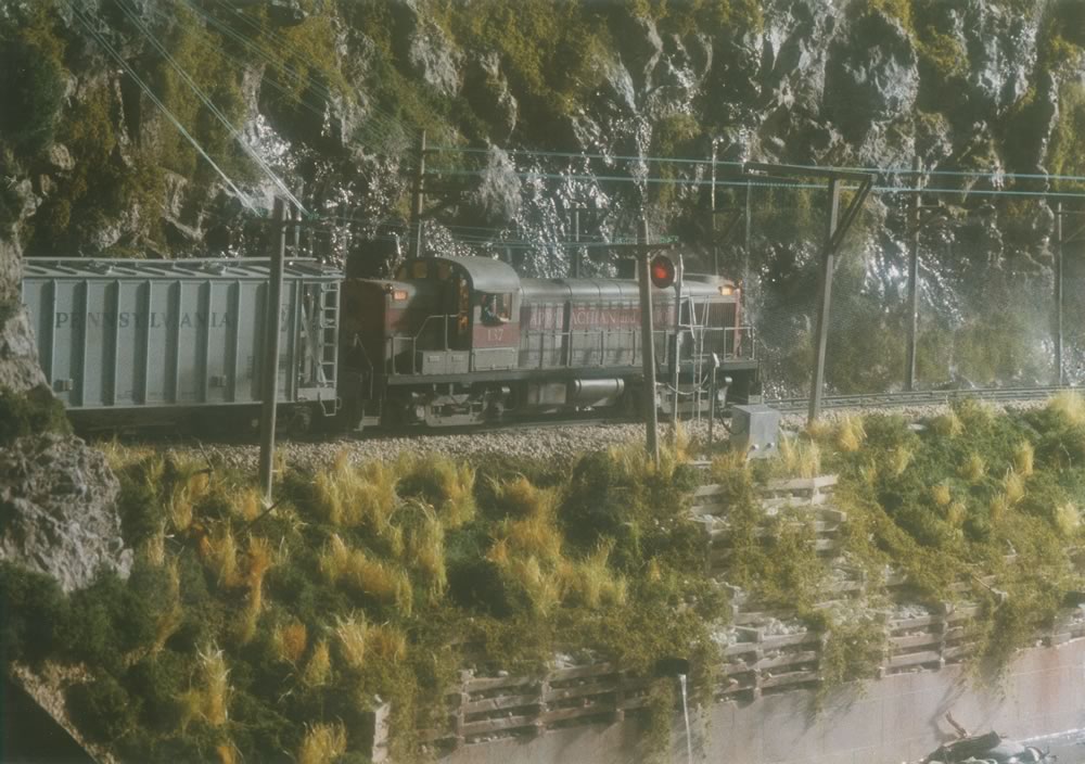  A&amp;O RS3 #137 leads Walden Turn out of Post Tunnel and into the gorge late on a rainy afternoon toward Bayfield. 