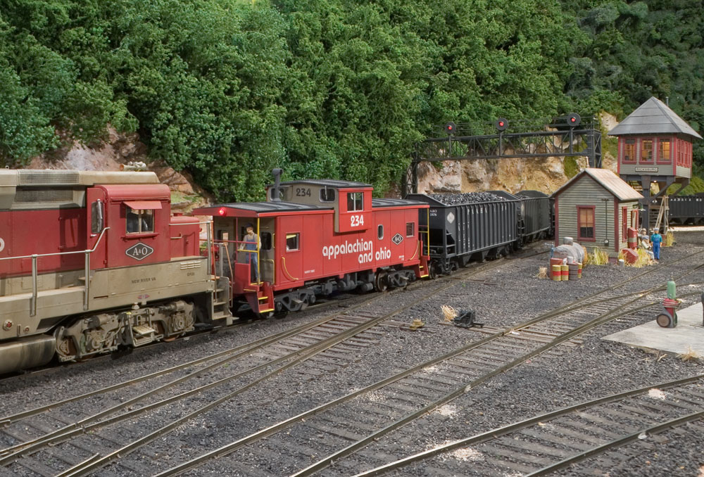  GP30 #410 is added to the rear of a coal extra as it exits the Willow Creek yard. 