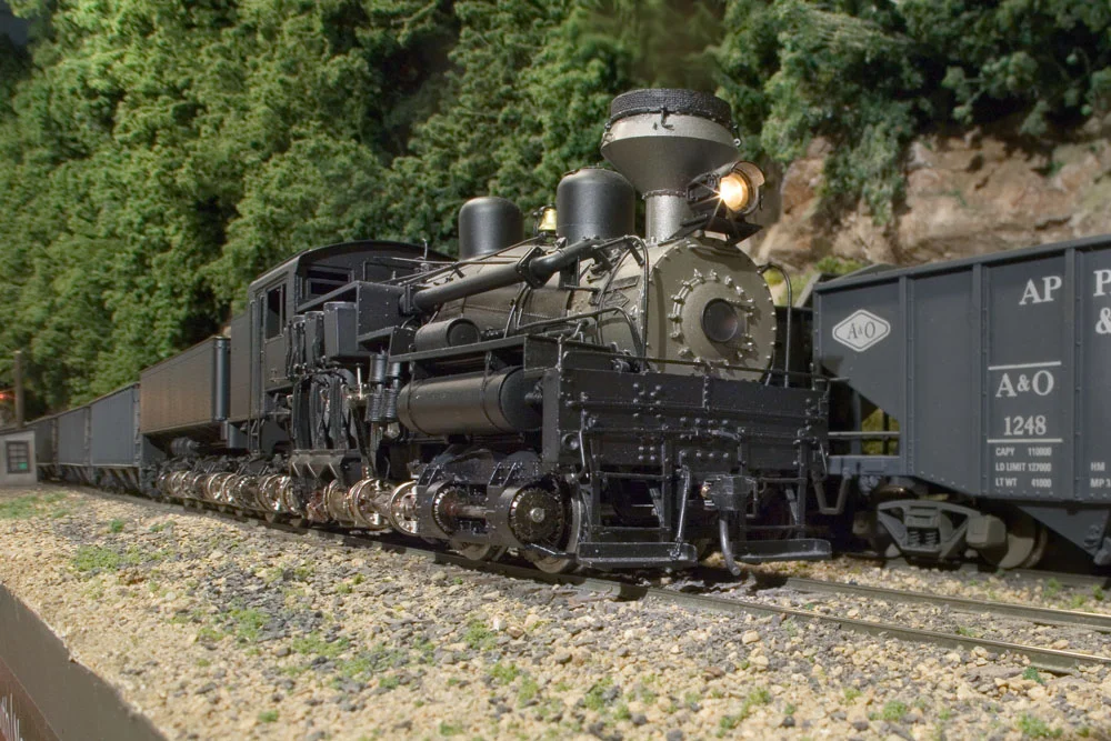 Bob Sobol's 4 truck Shay an ex-West Virginia Pulp & Paper unit has been rebuilt by the A&O historical society and now sees service hauling coal loads up to Willow Creek from Kayford.