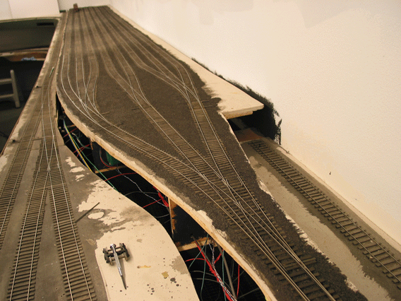 A look down the 16th St. 8 track hump yard. Typical of hump yards, it features three 3-way switches. Yard length is approximately18 cars.