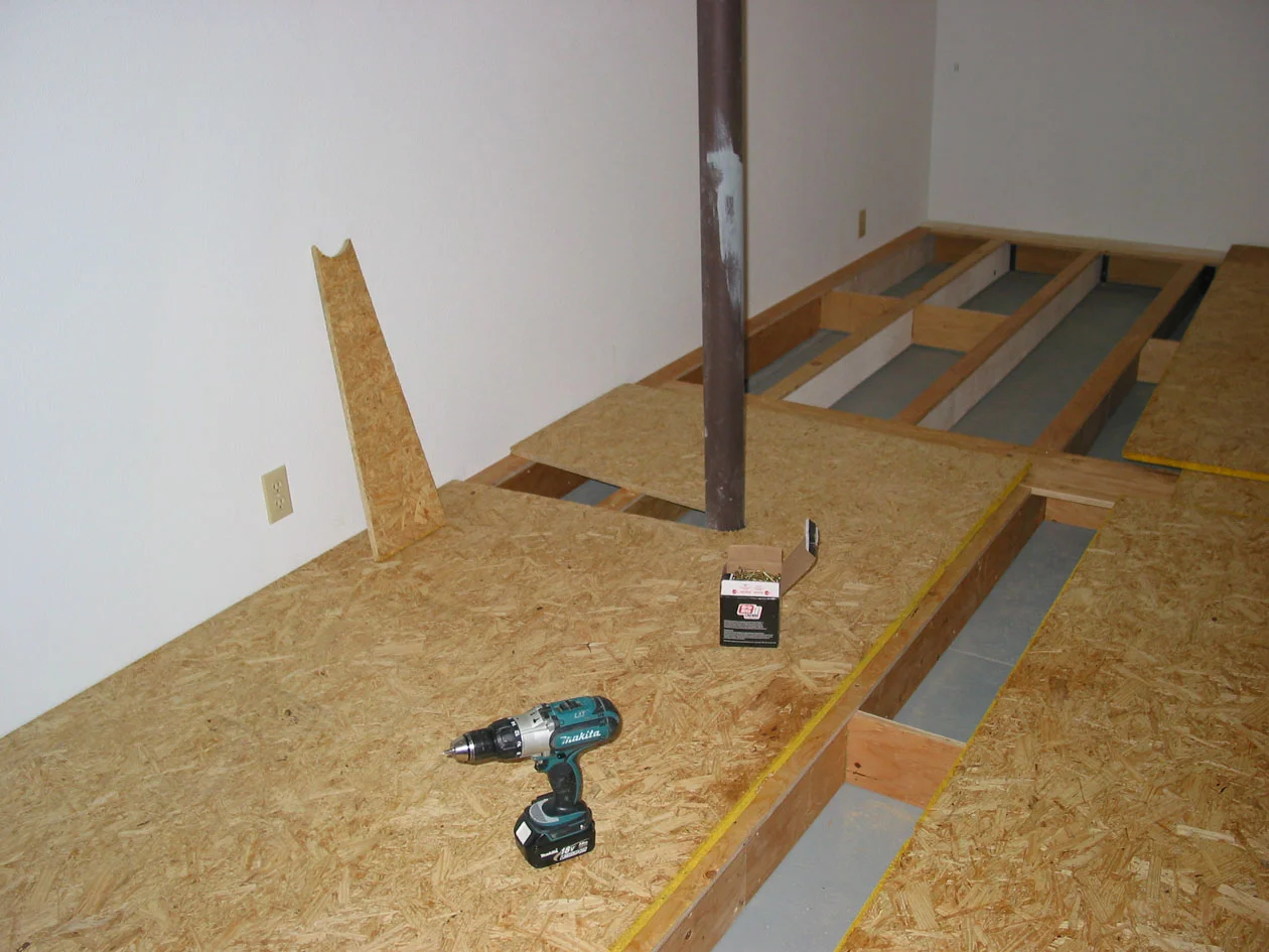 Regular tongue and groove 1" flooring was then glued and screwed to the framework.