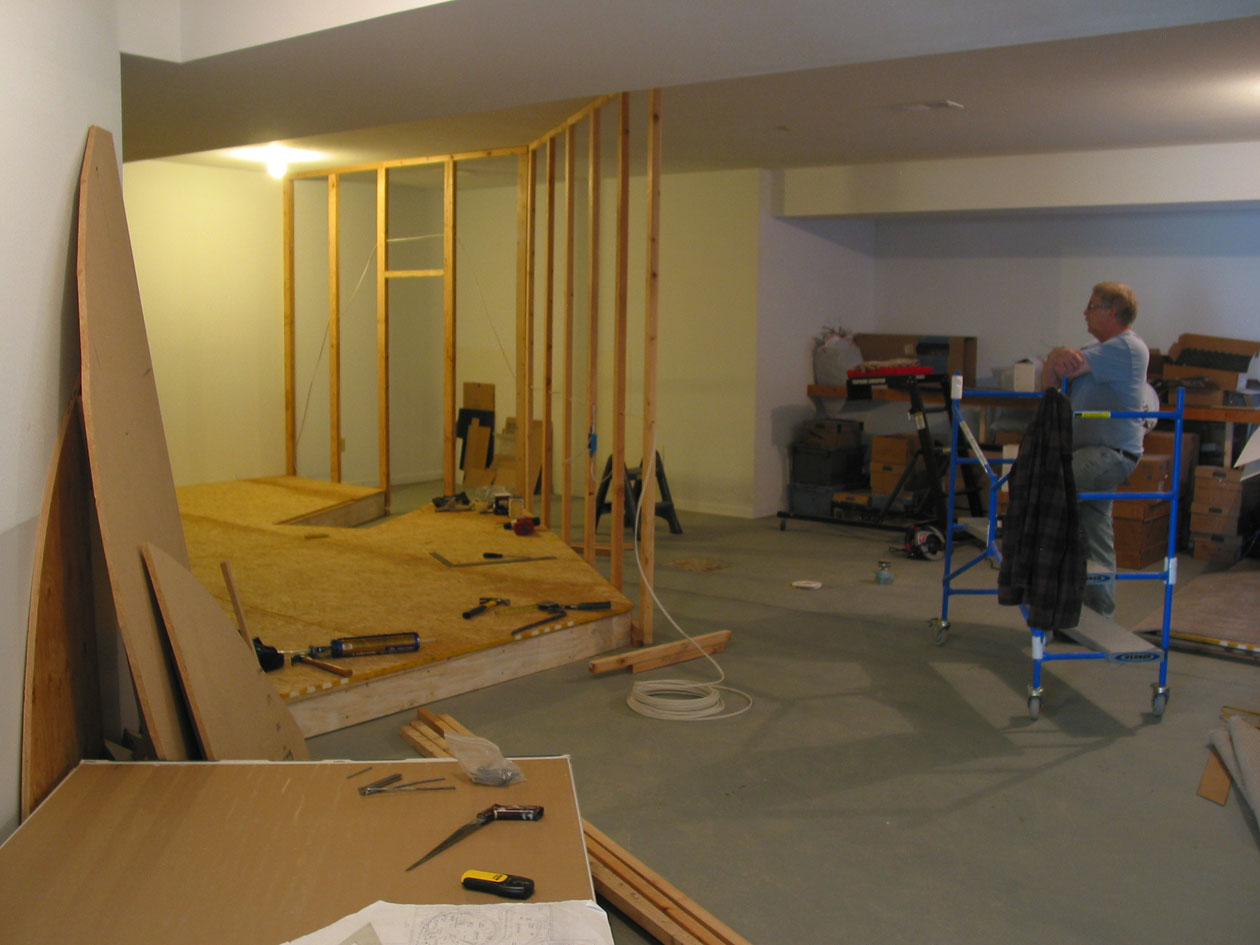  Bill Wood's former days as a house framer came in handy as we began to add the interior walls on 2.0. The open space of the basement was about to disappear. 