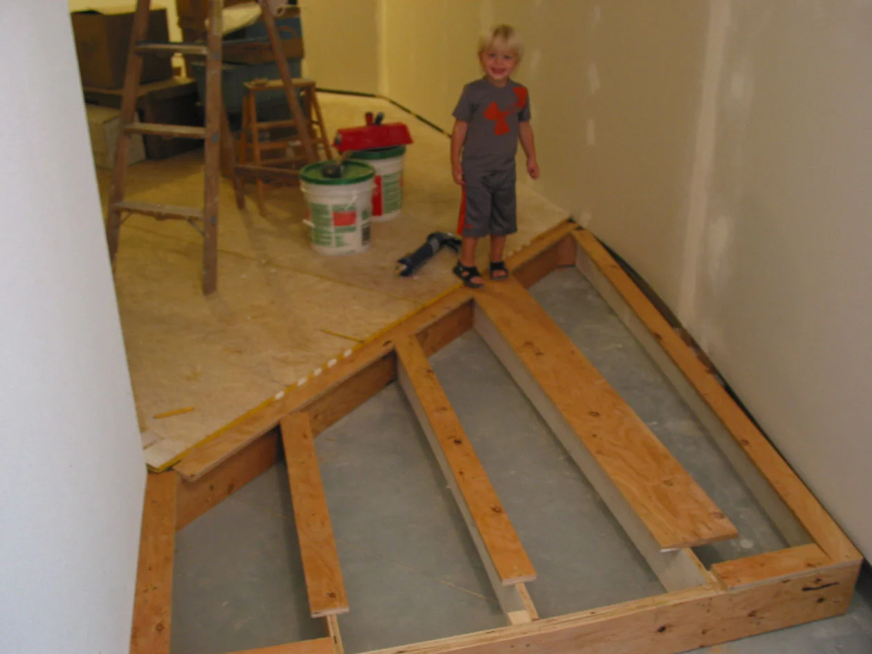With the walls in place, I could add the additional elevated floor necessary for entrance into Ridge. Today I am assisted by grandson Jett.
