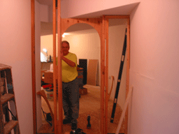  Bill Wood helps to frame an operator tunnel which encloses the rain room. The arched doorway will be lined with 1/8" hardboard. 