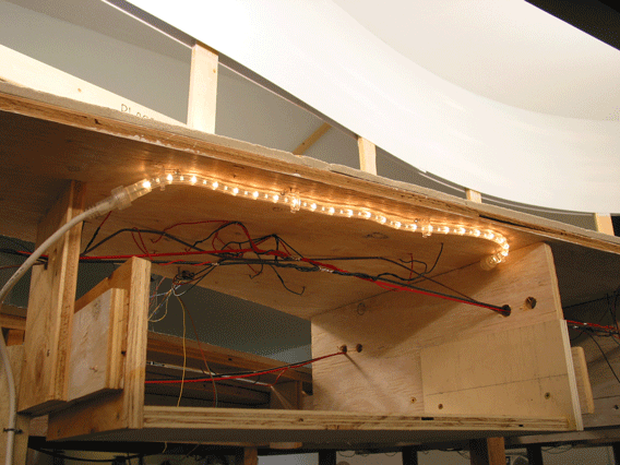  A work station under construction in Fillmore Heights shows the rope lighting installed for night ops at each station. Car cards will thus be readable under the &nbsp;moonlight of blue rope light. 