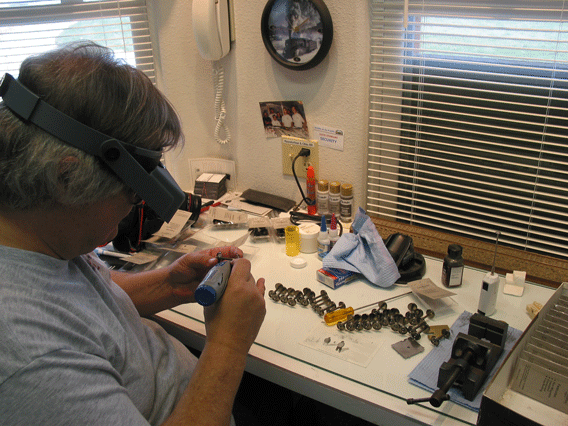  Bob Sobol has spent hours gauge-checking wheelsets and putting on resistors to make the car visible to the track detectors. All a necessary part of the CTC signaling system. 