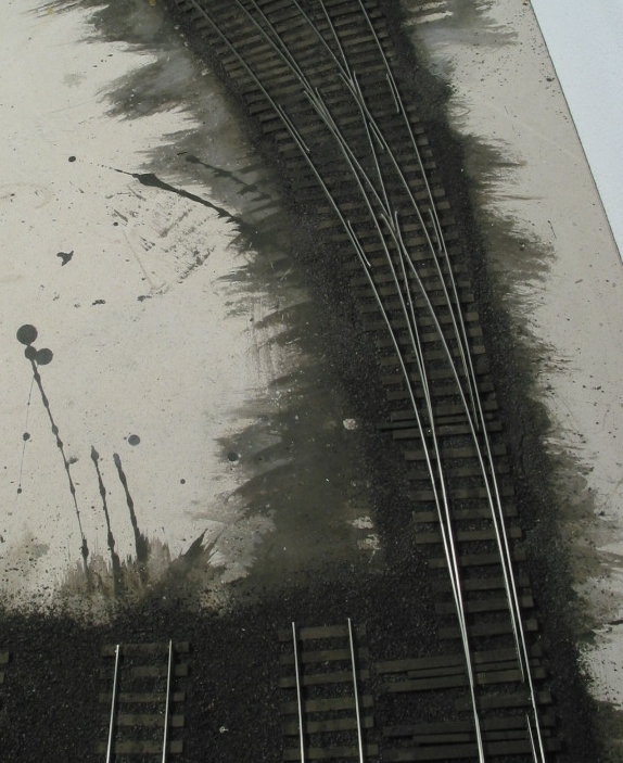  A three-way turnout begins the ladder into Taft Ave. staging yard, saving real estate and effectively lengthening each track. The stub end tracks are from the Dogtown staging yard. This brief section will be exposed from above and feature a transien