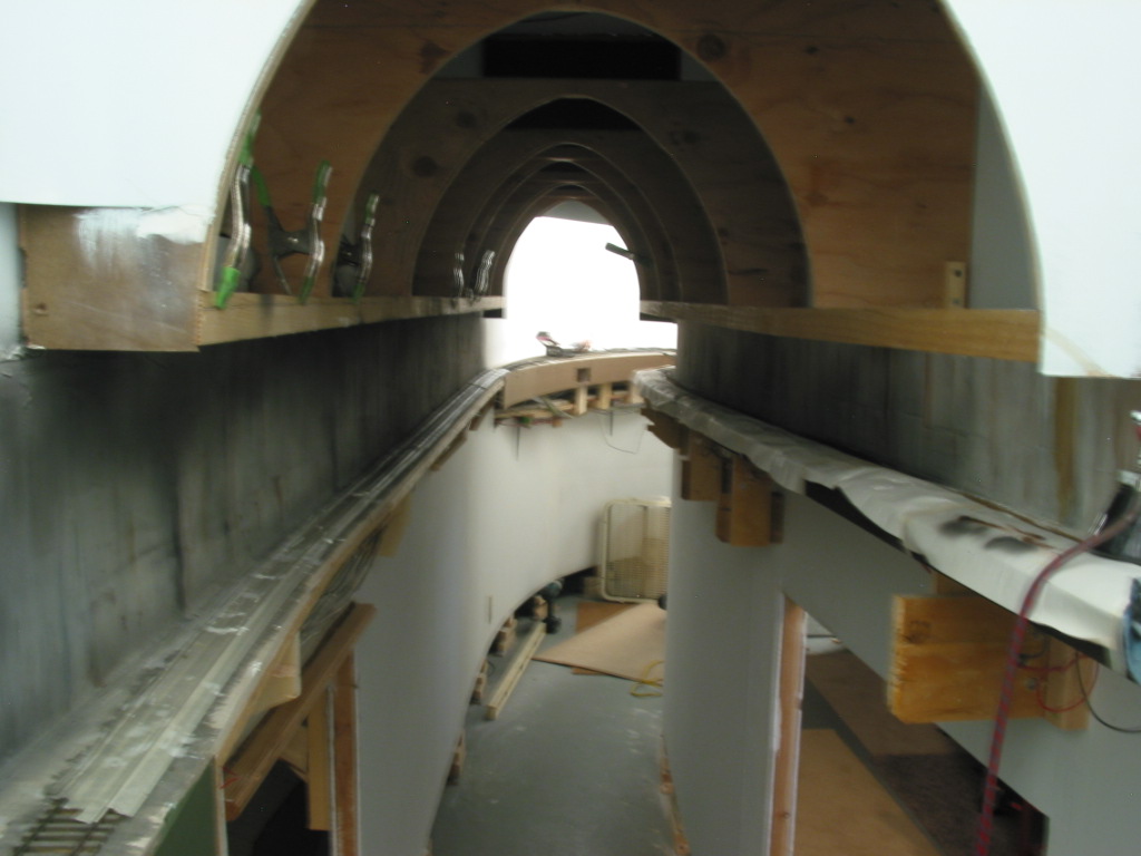  The long operator tunnel on the Kayford seemed an operational negative.....until I thought of having viewing portholes in the fascia to catch glimpses of the trains progress. But this required detailing the tunnel lining. So I added 1/4" drywall, jo
