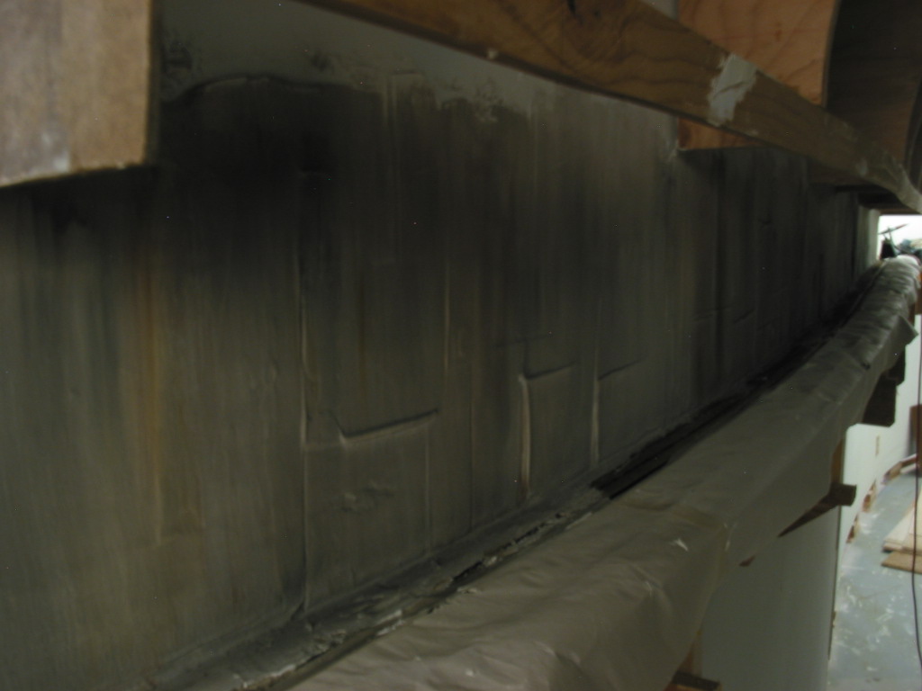  I left "mortar weep" lines in the joint compound as it was applied to the drywall so as to replicate imperfect form joints in the construction of the tunnel's interior. 