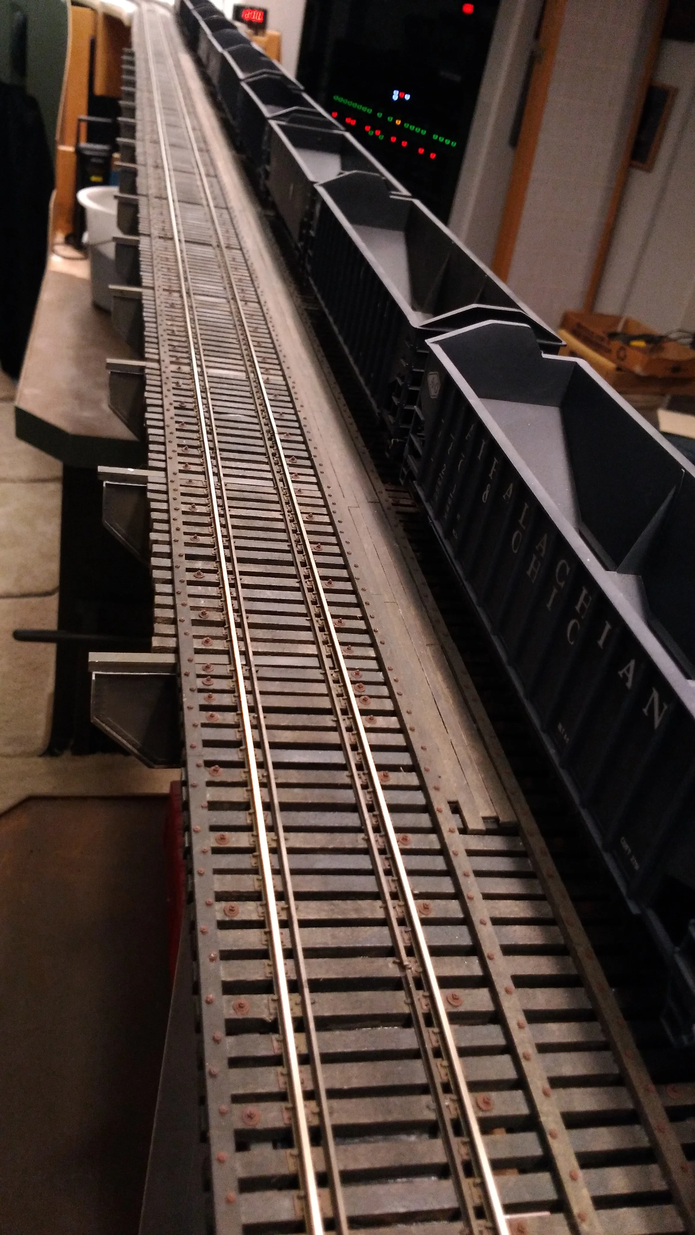 The Ohio River Bridge features full tie plate and NBWs as appropriate. That means 4 spikes per tie. This WAS a project. For pictures of the magnificent arched thru truss Vince is casting/building, see the Forum page under "Crew Logs".