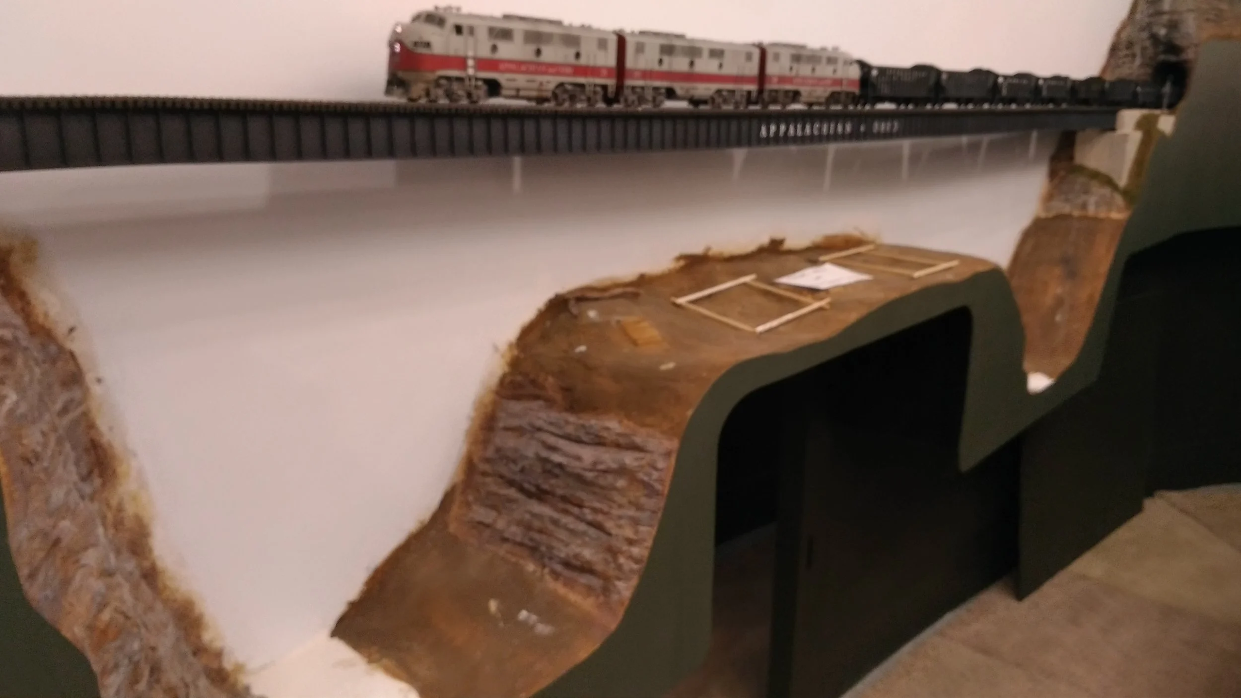 Yes, there is a slight sag under the weight of O scale locomotives! The towers will be built of brass to correct this. A WV State Campground is planned for the hump dividing each branch of Twin Creek (so named in honor of my twin daughters). Make your campsite reservations now as it should be quite a show from below.