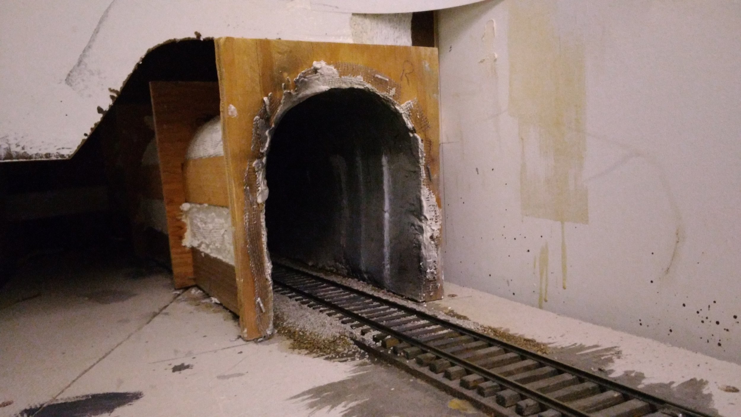  Leaving Apex we dive into Rockcut Tunnel. Lining the full length of a tunnel where possible makes sound equipped locos an awesome experience. The sound builds and the anticipation rises. The only thing missing is the hot blast.  Wood tunnel formers 