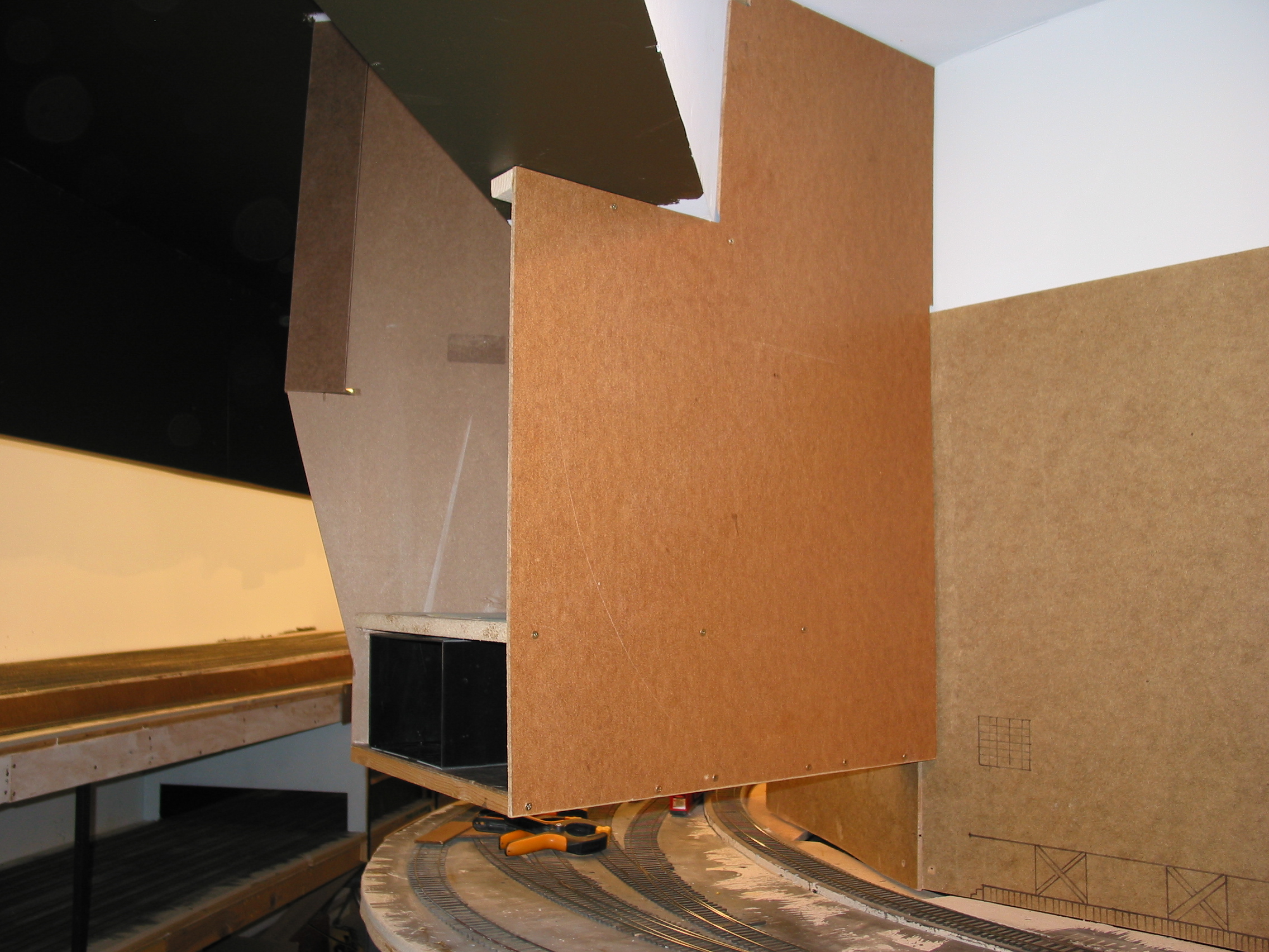  The templates have become 3/8" hardboard and pineboards form the interior shelves. 