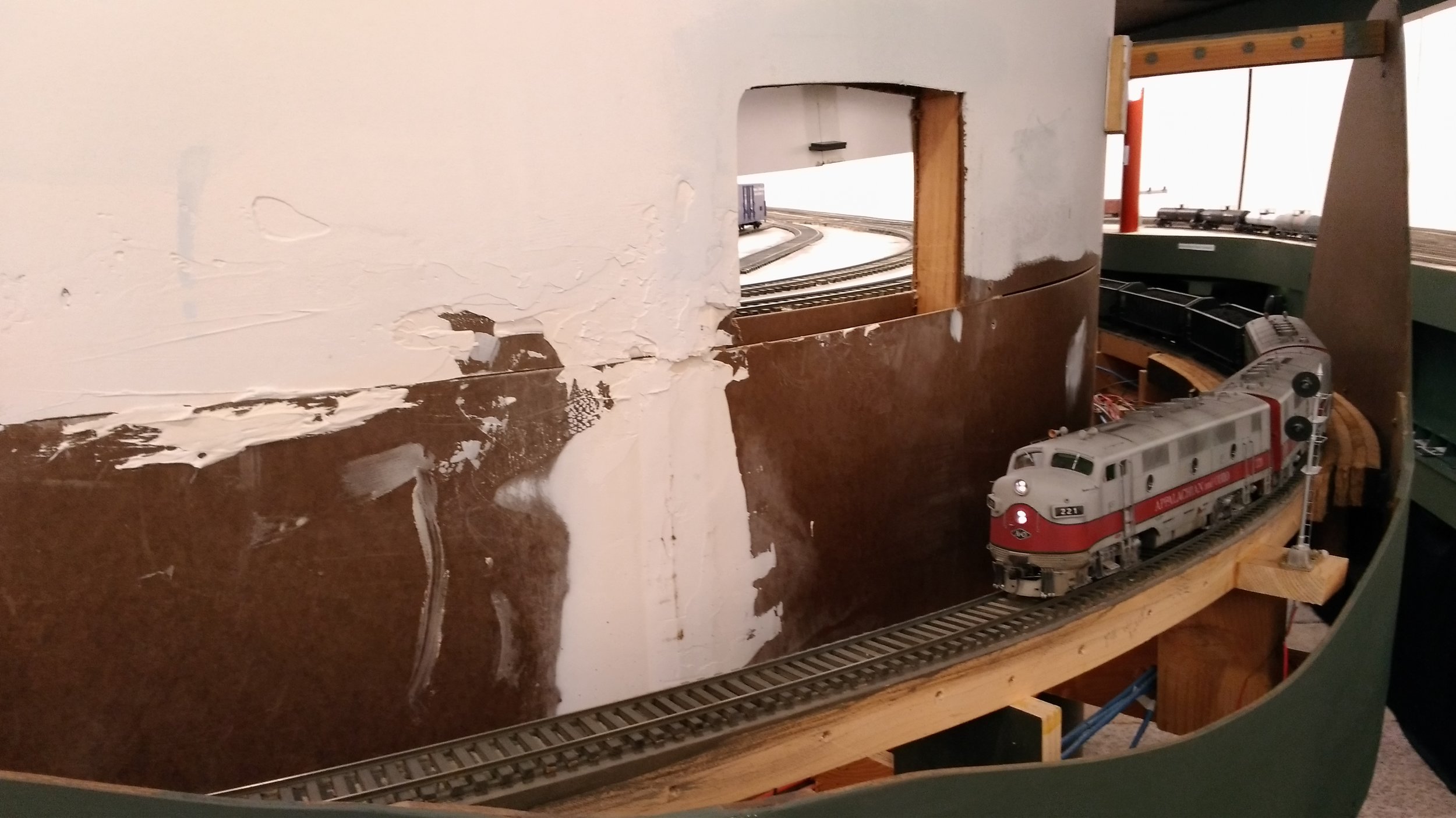  The 2.75% Coal Ridge Grade begins in earnest as we exit OS Union Gap. An open "window shade" shows how access to tracks on the Kayford Branch can be reached if needed. Removable scenery required. 